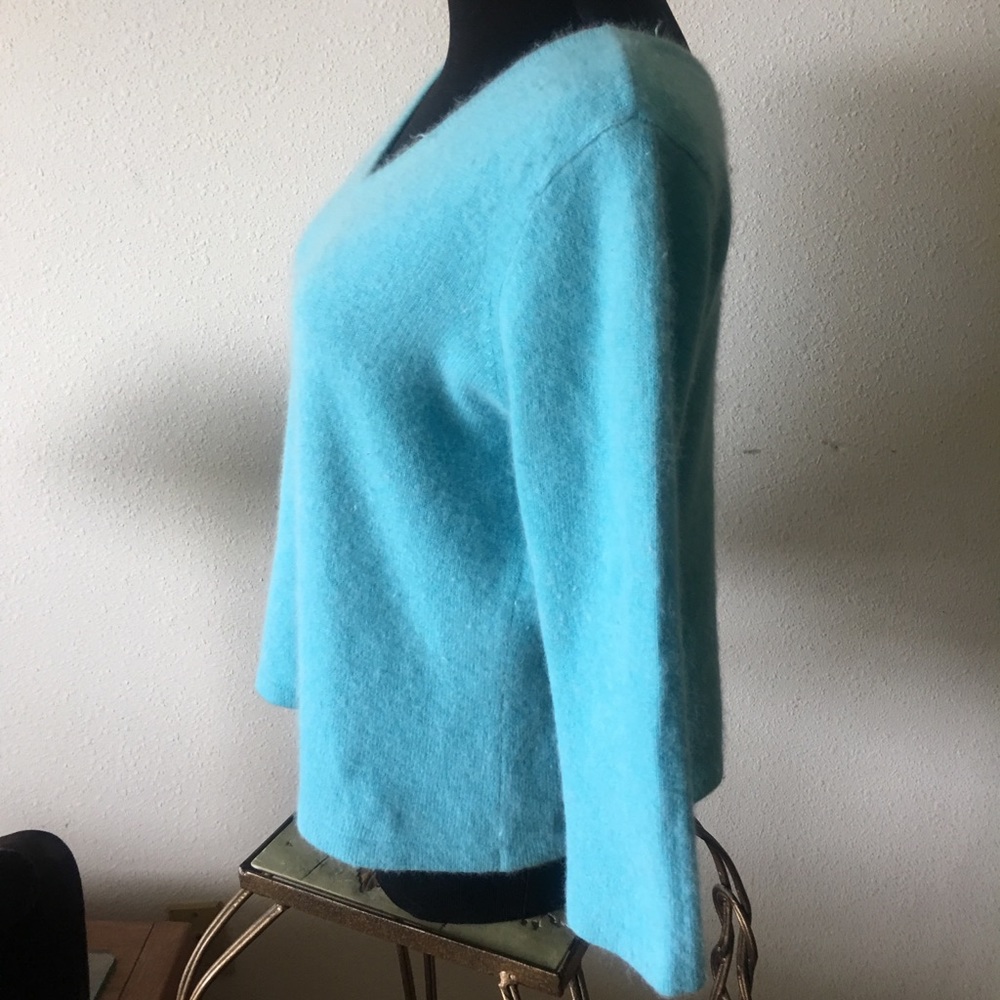 Apostrophe Angora/rabbit hair/lamb wool.